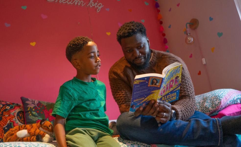 Dad and son reading